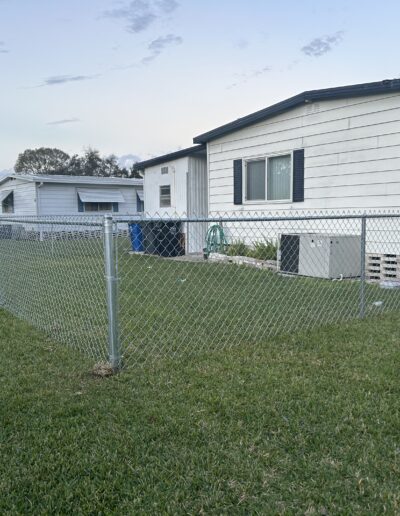 Metal Fencing around a Mobile Home with